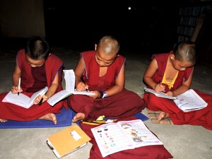 Monks preparing for Exam